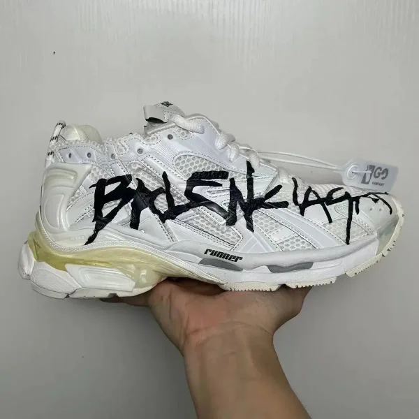 White graffiti runners shown in the linked Balenciaga catalog listing