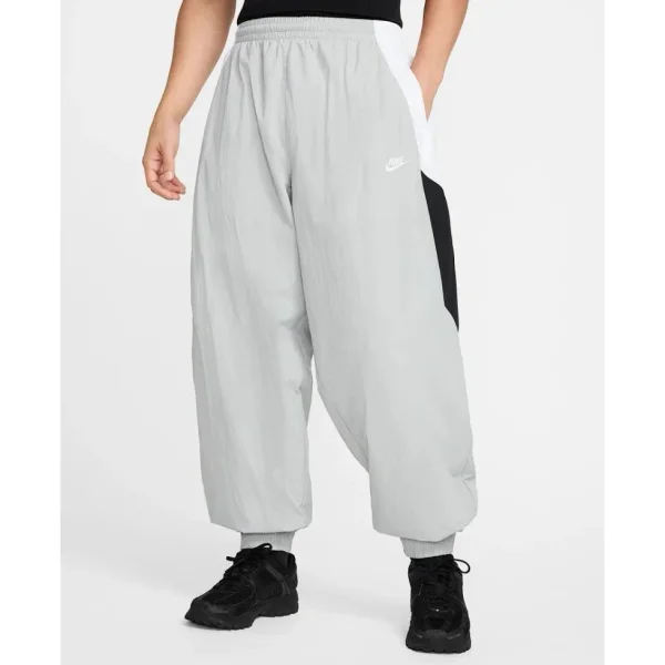 Light grey trousers shown in the linked Nike catalog listing