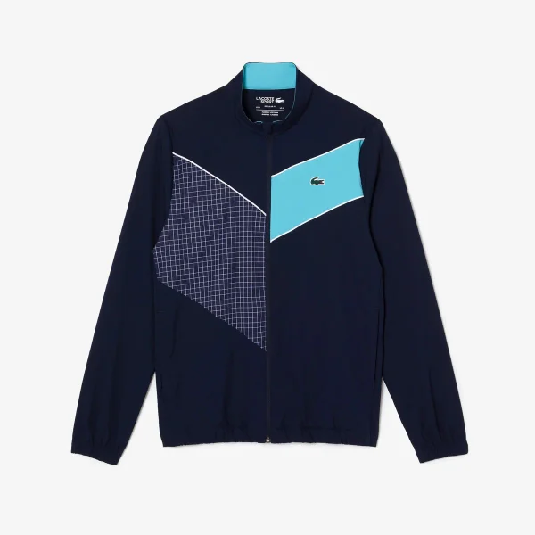 Navy & turquoise track jacket shown in the linked Lacoste catalog listing