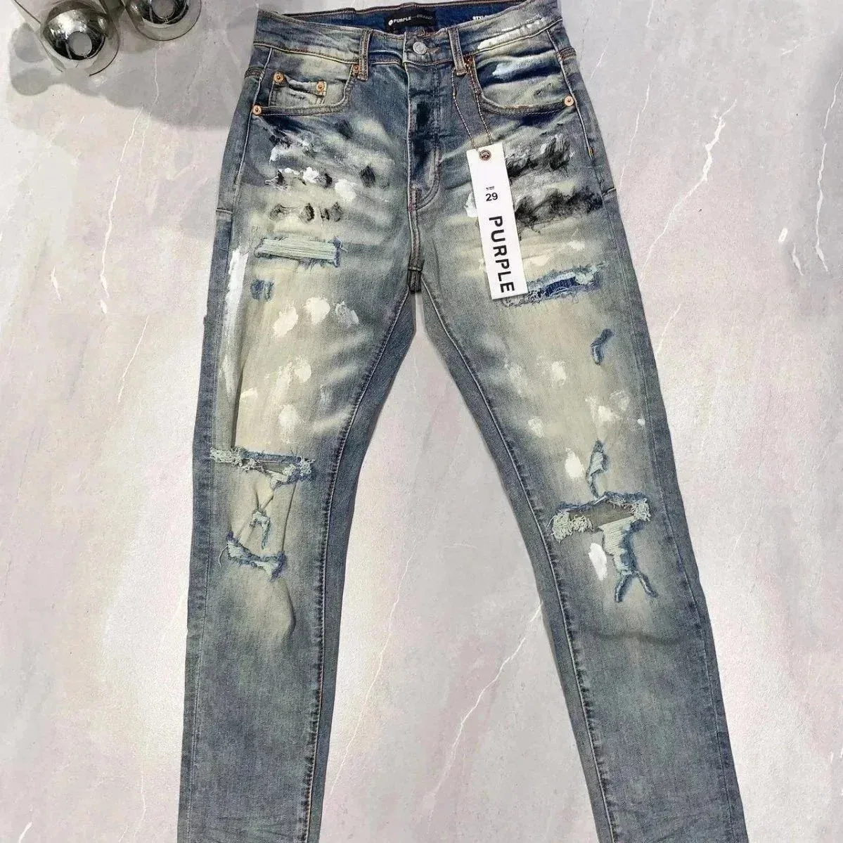 Blue denim jeans with distressed areas — Hipobuy Spreadsheet jeans selection