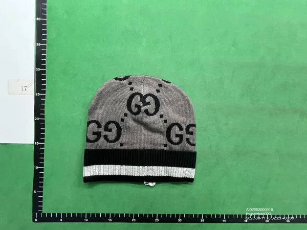 Grey monogram beanie shown in the linked Gucci catalog listing
