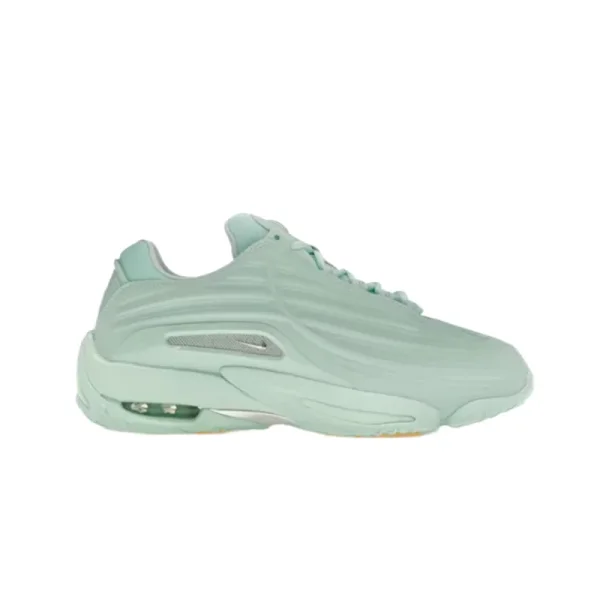 Mint sneaker with layered side panels in the linked catalog image