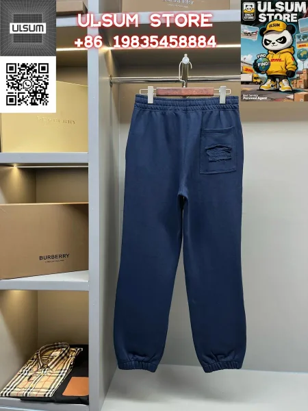Navy sweatpants shown in the linked Burberry catalog listing