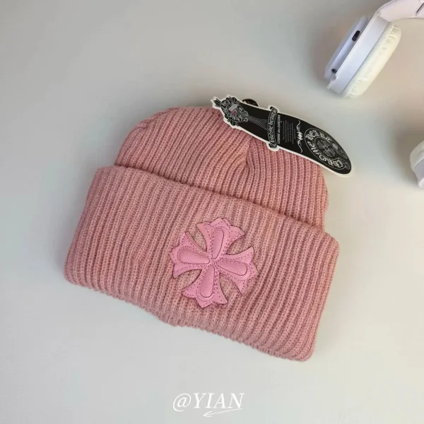 Pink cross beanie shown in the linked Chrome Hearts catalog listing